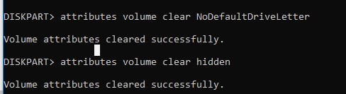 borrar atributos de volumen NoDefaultDriveLetter y hidden